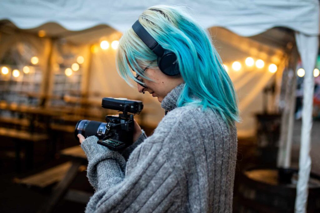 student adjusting their camera